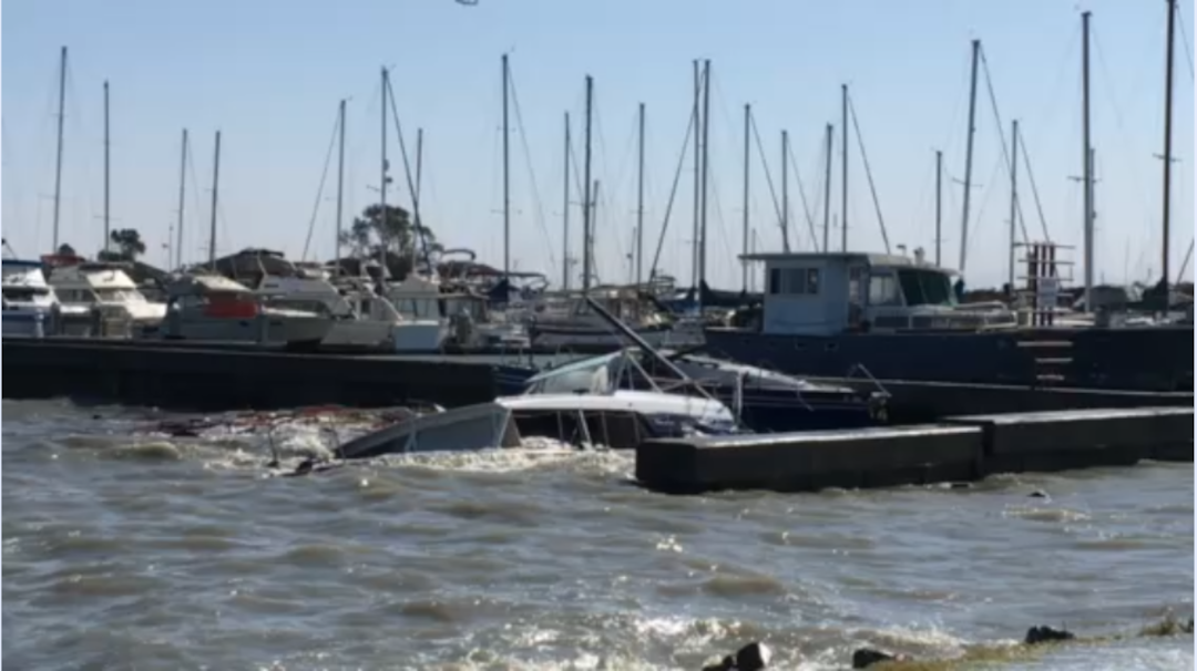 Our Boats (and Homes) shouldn’t end up like those two vessels washed up at the Oyster Point Marina Seawall…